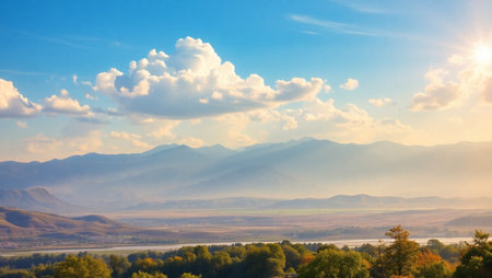 Autumn landscape with mountains, river and clouds on blue sky background