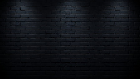 Black brick wall texture background. Dark brick wall with spotlights.の写真素材