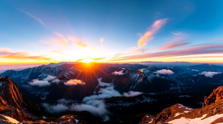 Beautiful sunset in the mountains. Panoramic view of the Alps.