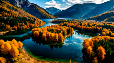 panoramic view of autumn alpine landscape with colorful forest and lakeの写真素材