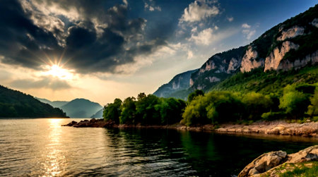 Panoramic view of the lake and mountains at sunset. Beautiful summer landscape.の写真素材