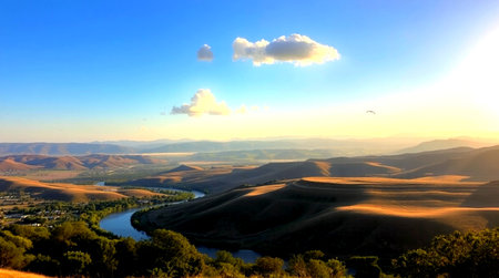 Panoramic view of the valley in the mountains at sunset.