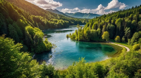 Aerial view of beautiful mountain lake with clear blue water and green forest.の写真素材