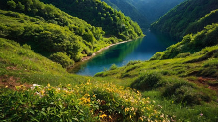 beautiful summer landscape with green mountains and blue lake in the morningの写真素材