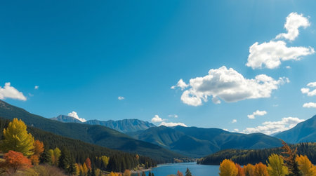 Colorful autumn alpine landscape with lake and mountains in background.の写真素材