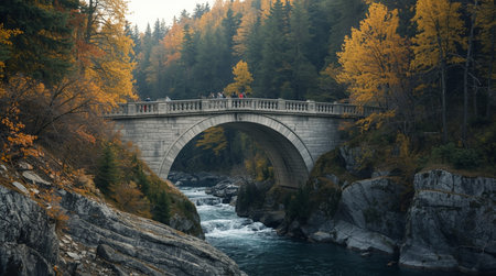Stone bridge over the river in the autumn forest. Beautiful nature landscape.の写真素材