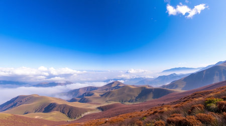 Mountain landscape with clouds on blue sky. Panoramic viewの写真素材