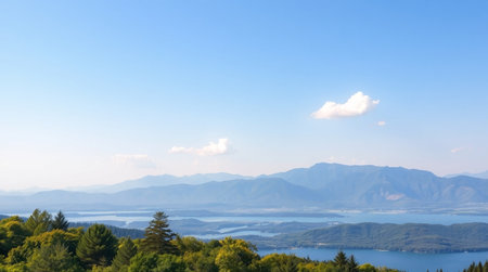 Panoramic view of the lake and mountains in the morning.