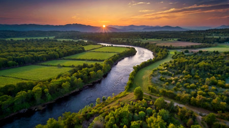 Aerial view of the river and forest at sunset. Beautiful summer landscape.の写真素材
