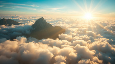 Beautiful aerial view of clouds and mountain peaks at sunset. Panoramic view.の写真素材