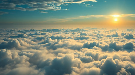 Beautiful aerial view above clouds at sunset. Panoramic view above clouds.の写真素材