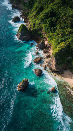 Aerial view of beautiful tropical beach with turquoise water and rocks.の写真素材