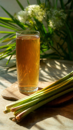 Lemongrass juice in a glass with fresh lemongrassの写真素材