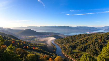 Panoramic aerial view of foggy valley in the morning.の写真素材