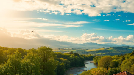 Beautiful summer landscape with mountains, river and blue sky with cloudsの写真素材