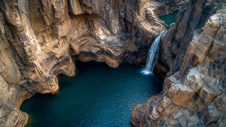 Aerial view of a waterfall in a canyon. Beautiful landscape.の写真素材