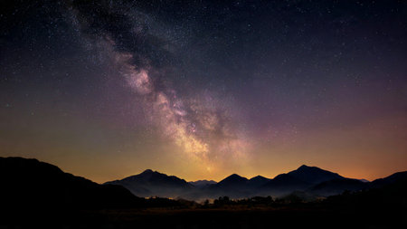 Milky Way over the mountains at dawn with stars in the sky