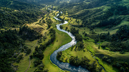 Aerial view of a small river in the middle of the mountains