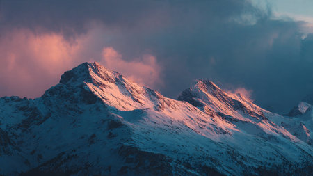 Snowy mountain peaks at sunset. Caucasus Mountains, Georgia, region Gudauri.