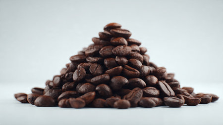 Coffee beans on a white background. Selective focus.の写真素材