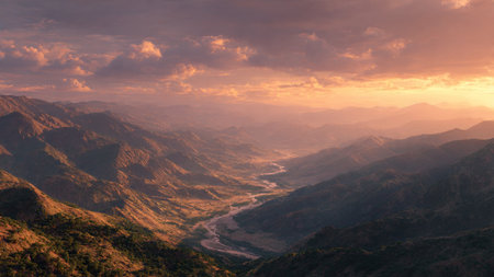 Aerial view of mountains and river at sunset in Yunnan, Chinaの写真素材