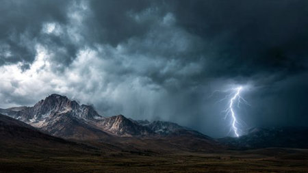 Lightning strike over the mountains. Thunderstorm over the mountains.