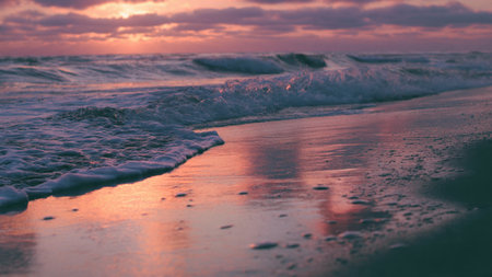 Beautiful sunset on the beach. Seascape with waves.の写真素材