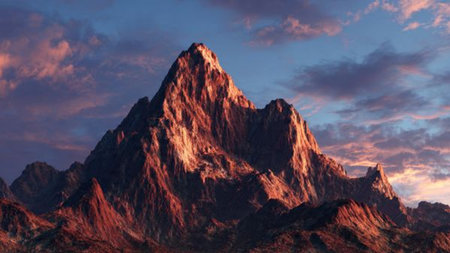 A panoramic view of mountains layered in blue gradients.