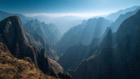 A dreamlike sunset casting purple hues across calm waters.の写真素材