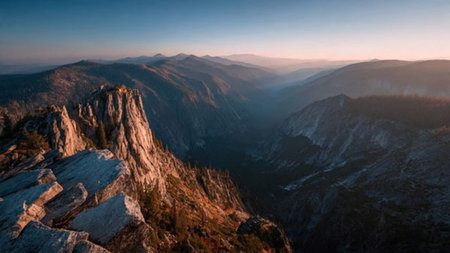 A panoramic view of mountains layered in blue gradients.の写真素材