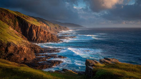 Mist wraps the base of the cascade like a translucent veil.の写真素材
