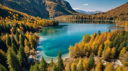 Yellow and green valley next to bright river.の写真素材