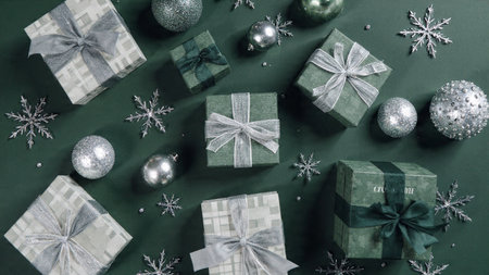 Silver star cluster border paired with minimal green ball ornaments.の写真素材