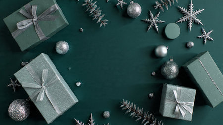 Clean and modern holiday layout with chrome-like silver elements and muted green tones.の写真素材