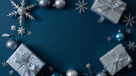 Refined winter display with polished silver ribbons and frosty blue surfaces.の写真素材