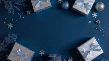 Blue gift boxes with clean metallic bows arranged in a modern holiday grid.の写真素材