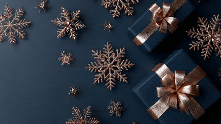 A holiday frame formed using blue and rose-gold elements in a balanced circular design.の写真素材