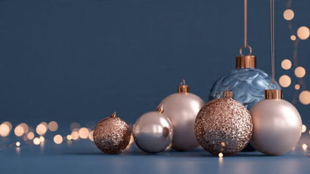 A high-end winter mockup with shimmering rose-gold snowflakes displayed on a matte midnight-blue surface.の写真素材