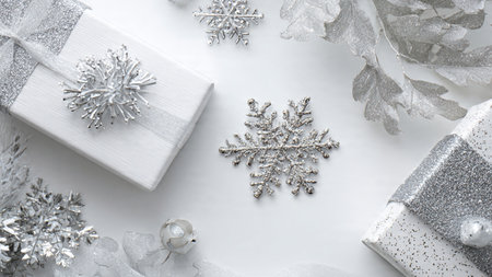 Christmas composition. Gifts, snowflakes on white background. Flat lay, top view, copy space