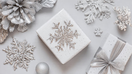 Christmas composition. Gifts, snowflakes on white background. Flat lay, top view, copy space
