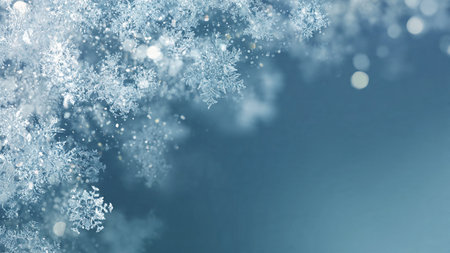 A misty blue winter backdrop with bokeh lights and snow sparkle.の写真素材