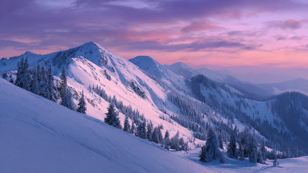 Crisp mountain peaks sit beneath soft pastel illumination.