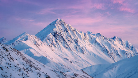 High-definition snowy surfaces under soft pink light.