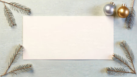 Elegant blue winter Christmas design with pine accents and refined silver ornamentation.の写真素材