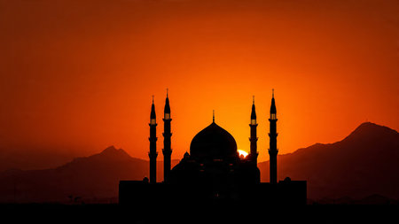 Silhouette of mosque at sunset, Ramadan Kareem background.の写真素材