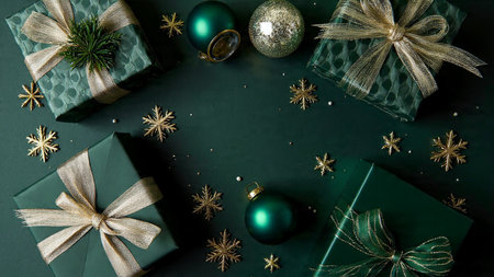 Christmas or New Year background. Gifts and decorations on a black background.