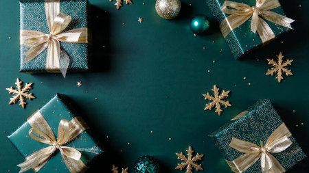 Christmas or New Year background with presents and snowflakes. Flat lay, top view.