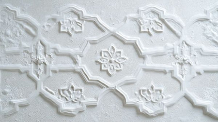 Arabic pattern on the wall of the building. White background.