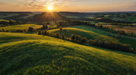 Snow-covered peaks glowing under pink sunrise sky.の写真素材