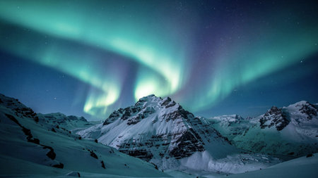 Aurora borealis in the winter mountains, Iceland, Europe